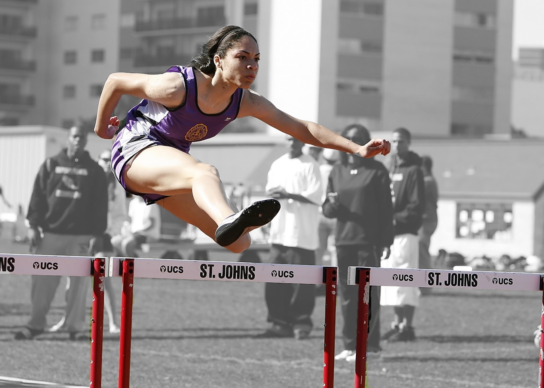 Woman running hurdles